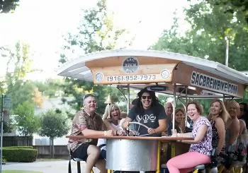 Pedal, Drink, and Bar hop through Sacramento on a 15 seat Beer Bike