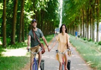 From Paris: Highlight of Versailles Full Day Bike Tour with Royal Gardens, Queens' Hamlet, & Picnic Stop