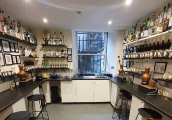 Distill a bottle of gin on mini copper stills Edinburgh